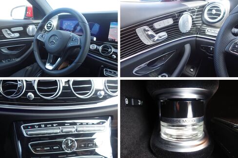 The E-Class comes with plenty of buttons and knobs, plus a pinstripe interior option. The vial of fragrance (bottom right) is located in the glove box.