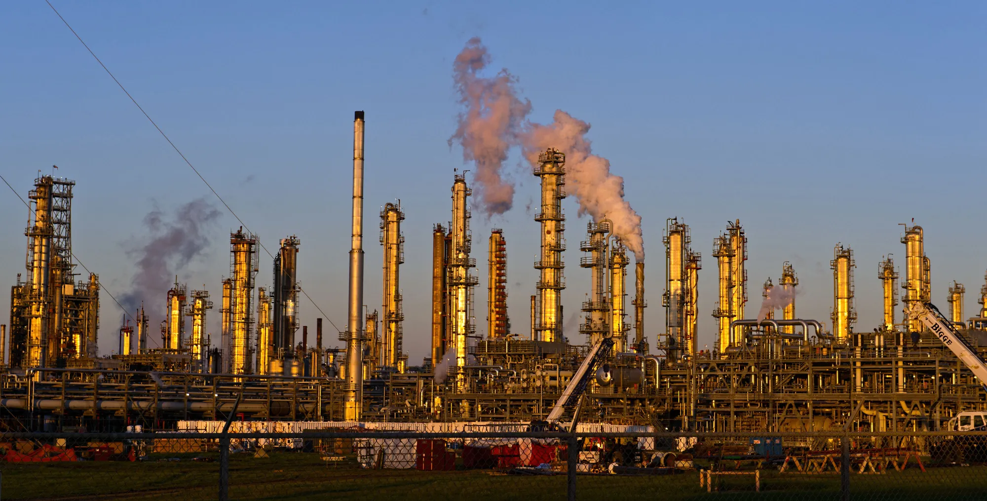 Views Of Tankers & Refineries As Oil Trades Near 12-Year Low