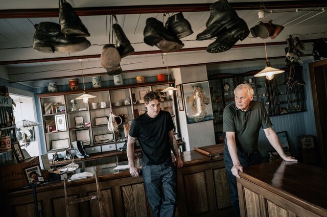Gustav Witzøe Junior and Gustav Witzøe Senior in the family's old store, built in the late 1800s.
