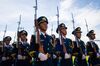 Members of the People's Liberation Army (PLA) march during a flag raising ceremony at an open day at the Ngong Shuen Chau Barracks in Hong Kong, China, on Sunday, June 30, 2019. China's army is holding its annual open house in Hong Kong this weekend, even as historic protests challenge the city's Beijing-backed government.