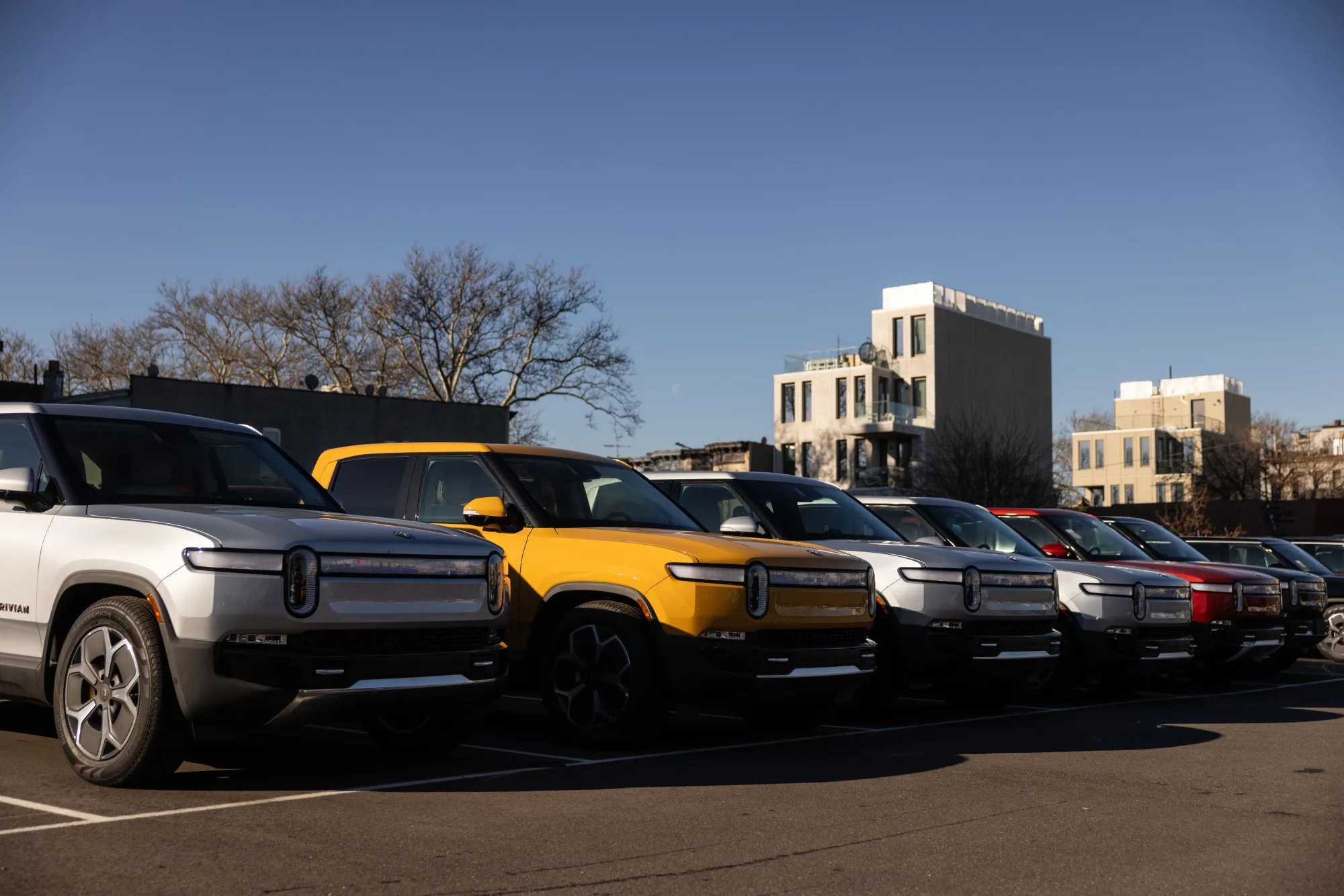 Rivian vehicles at a service center in New York.