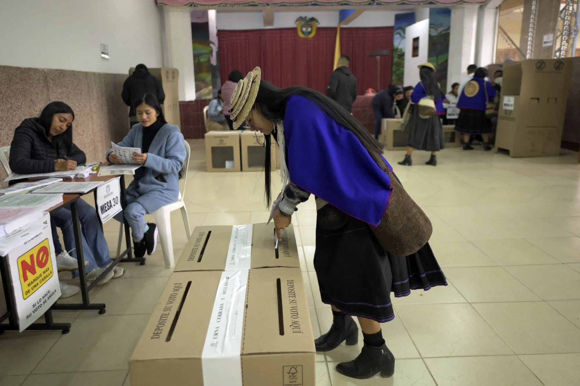 Whoever wins will have to dig Colombia out of a deep fiscal hole.