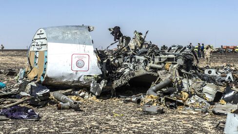 Debris of the A321 Russian airliner lie on the ground a day after the plane crashed in Wadi al-Zolomat, a mountainous area in Egypt's Sinai Peninsula, on Nov. 1, 2015.