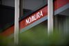 The Nomura Holdings Inc. logo is displayed outside a Nomura Securities Co. branch in Tokyo, Japan, on Tuesday, Jan. 29, 2019. Nomura is scheduled to release earnings figures on Jan. 31.