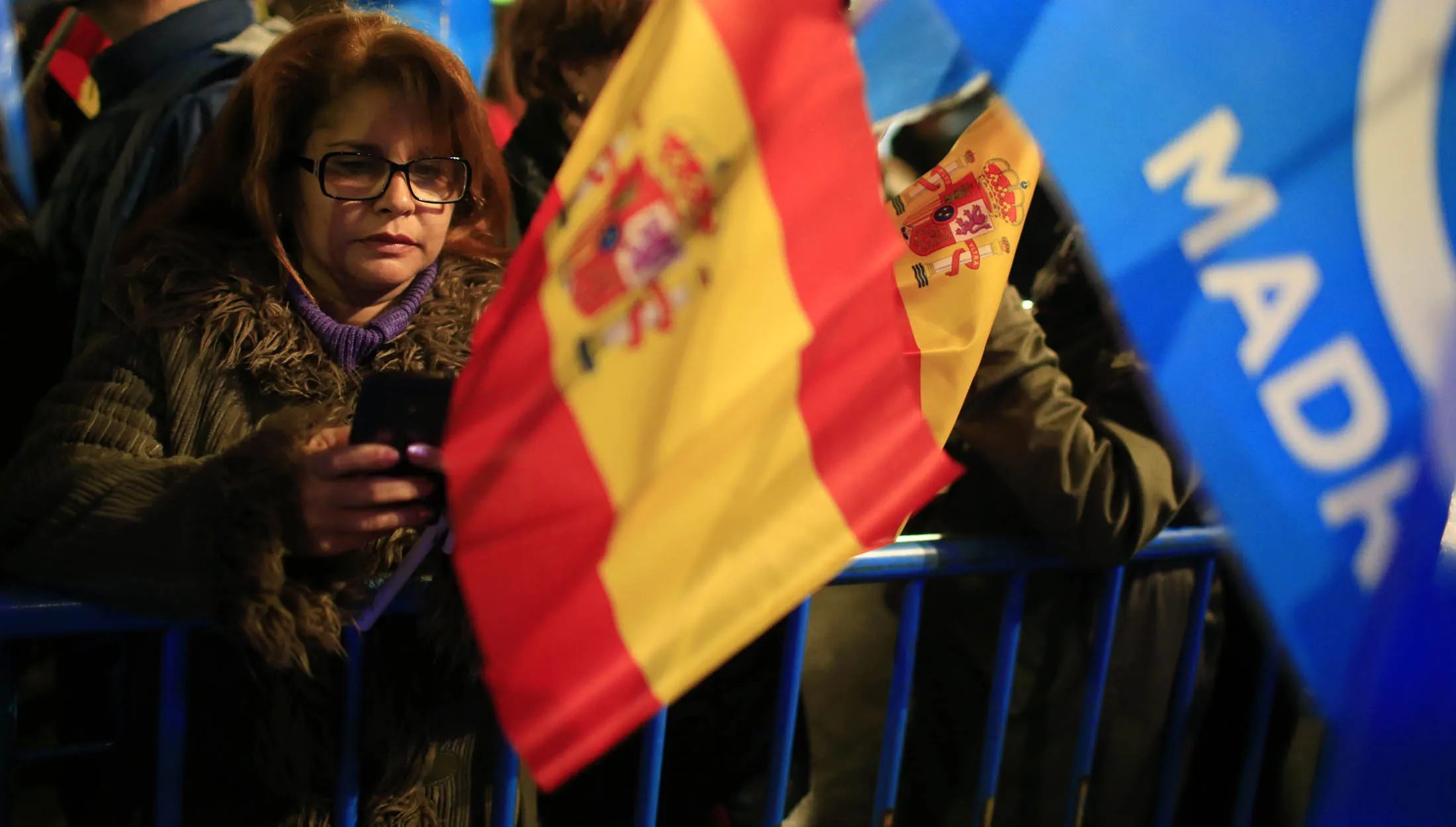 People's Party (Partido Popular) supporters wait for the results during the Spanish general election outside the party's headquarters in Madrid, Spain, on Sunday, Dec. 20, 2015. Spaniards are voting in the tightest election since the country's return to democracy, with four parties in the running and no clear winner in sight.
