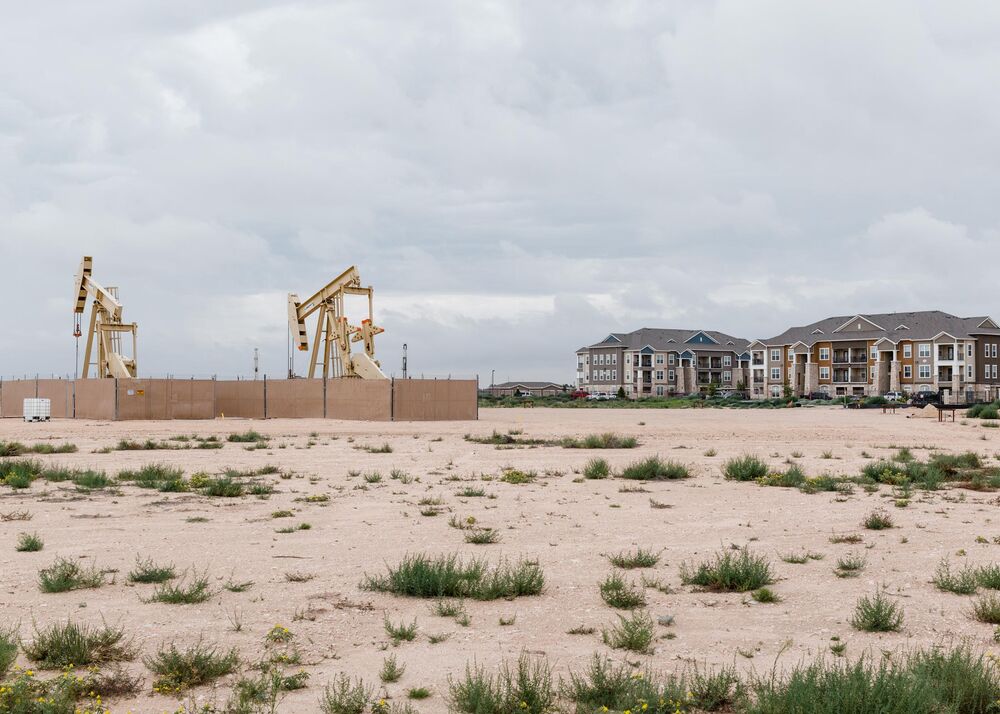 Oil pump jacks adjacent to an apartment complex in Midland, Texas.