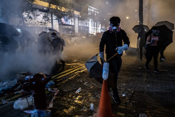 Hong Kong Says Dollar Peg, Banks Remain Strong Amid Protests