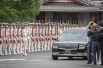 A car carrying the body of Shinzo Abe leaves Zojoji temple where his funeral was held on July 12.