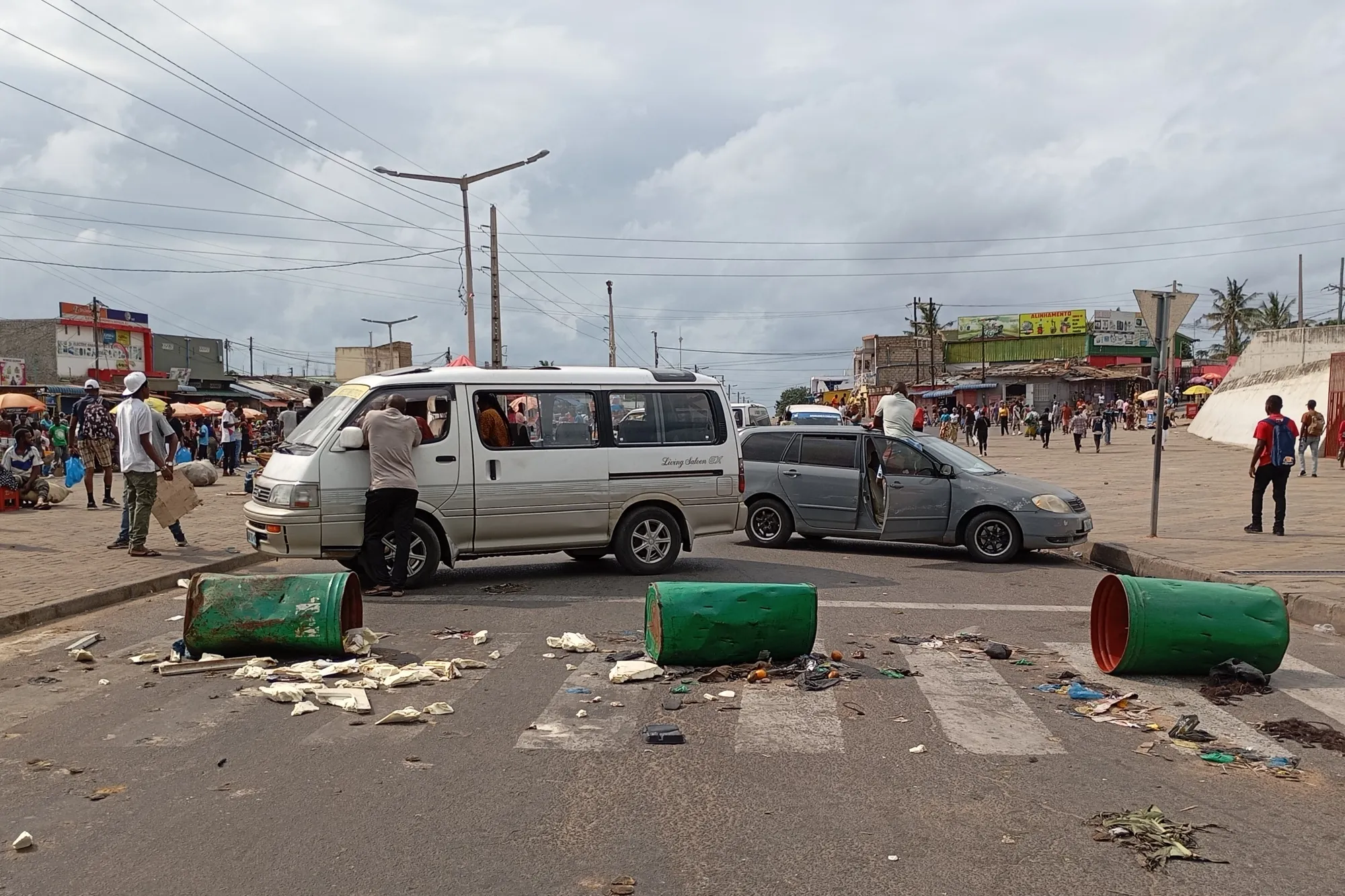 A barricade obstructs access to the road for vehicles during a demonstration against the government in Maputo on Dec. 7.