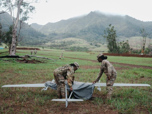 Soldiers cover a reconnaissance drone following an exercise at the Jungle Operations Training Center. 