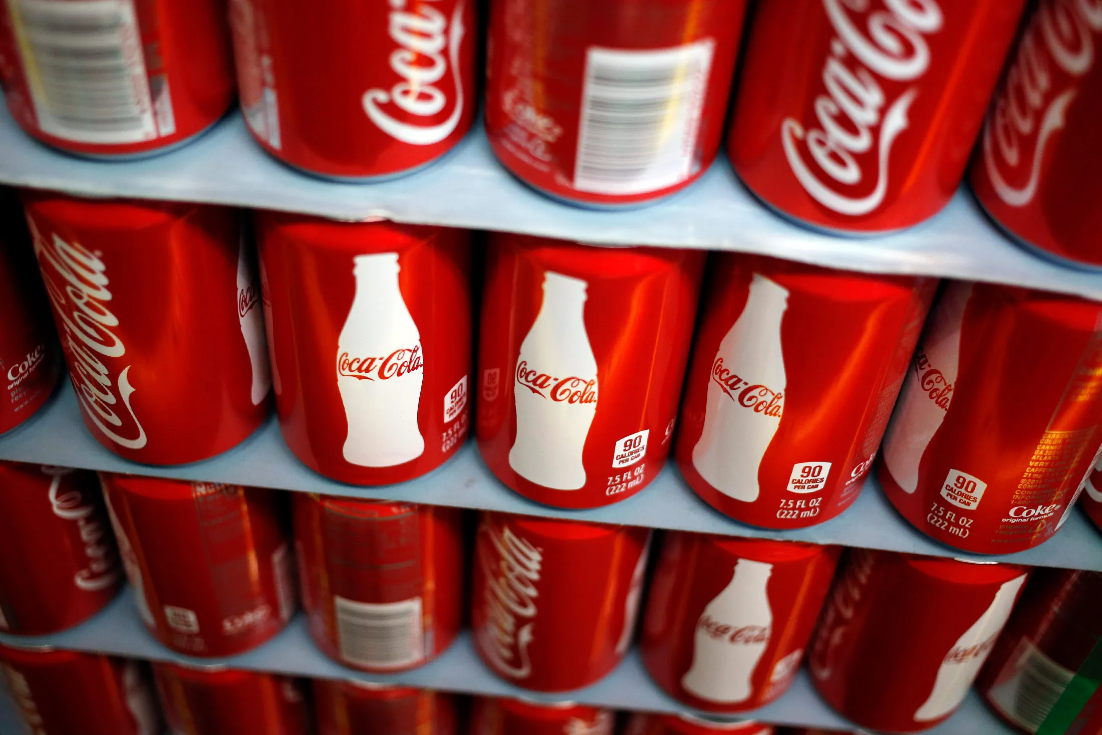 A pallet of Coca-Cola Co. Classic brand soda cans sits stacked inside the warehouse at the Ball Corp. beverage can manufacturing facility in Findlay, Ohio, U.S., on Thursday, Jan. 12, 2017. The Federal Reserve is scheduled to release U.S. industrial production figures on January 18.
