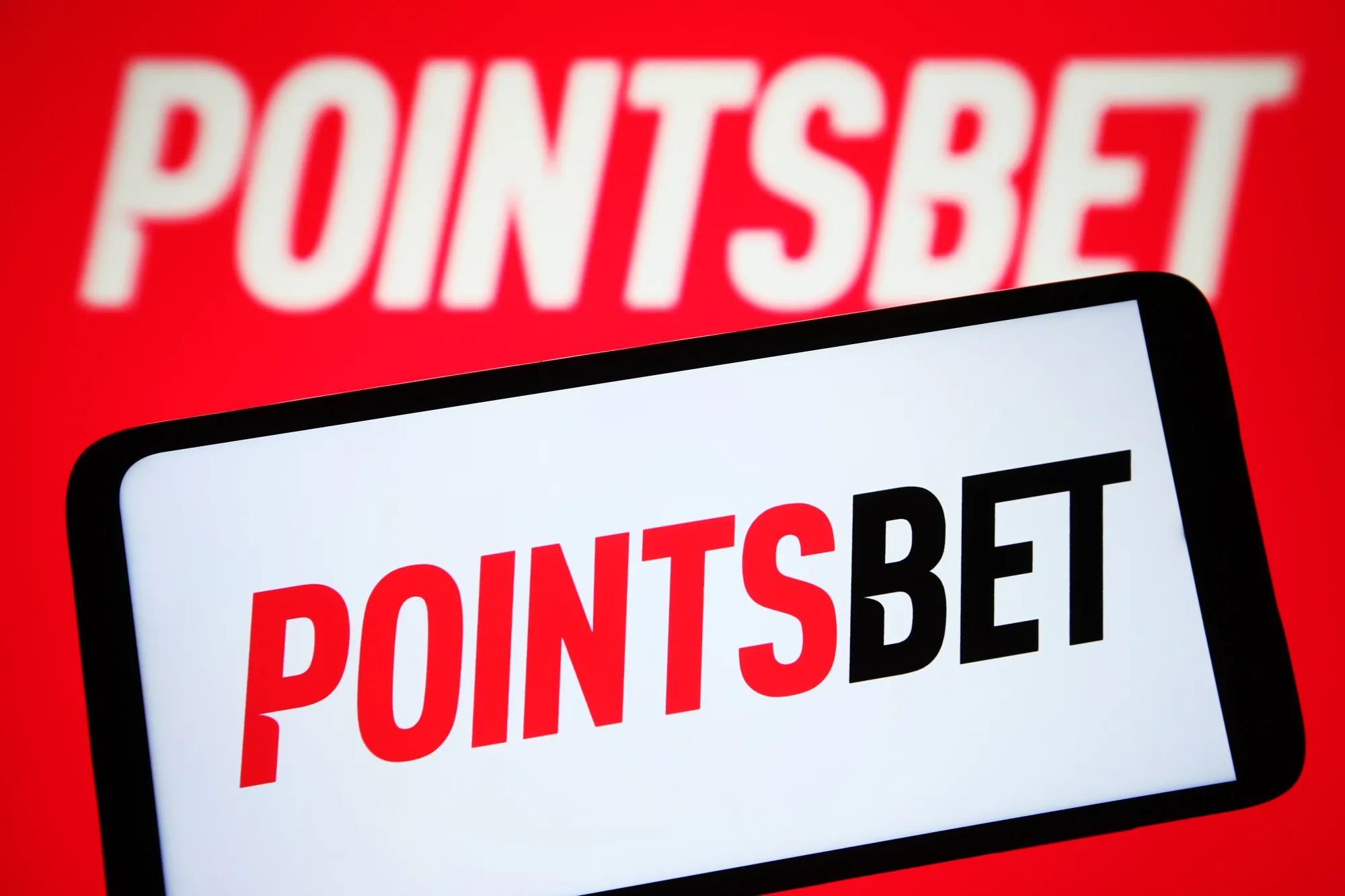 Pointsbet app interface on mobile devices showing live betting markets