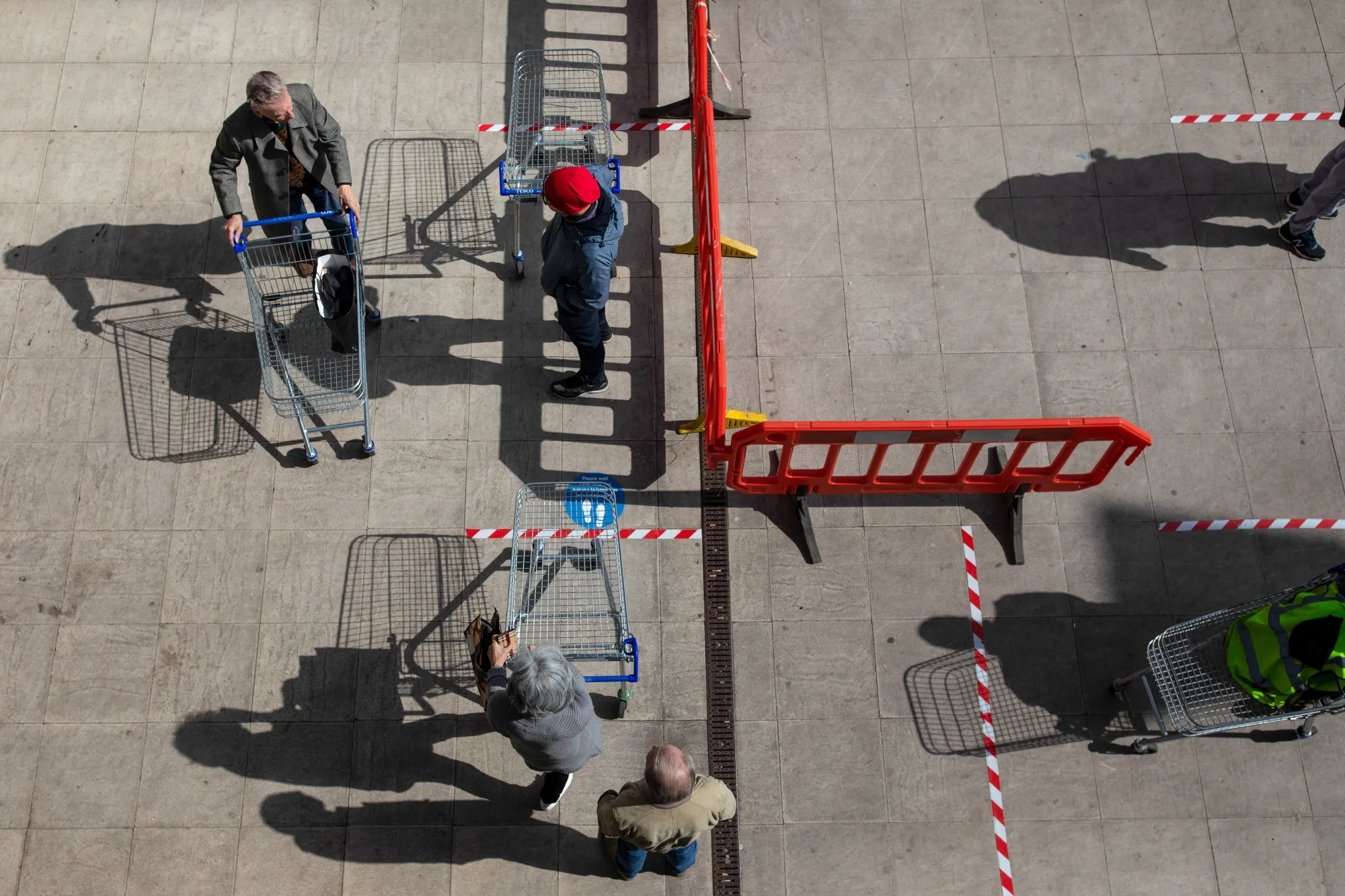 Social distancing with a shopping cart.