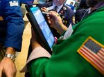 Trading On The Floor Of The NYSE As Stocks Fluctuate Ahead of Earnings