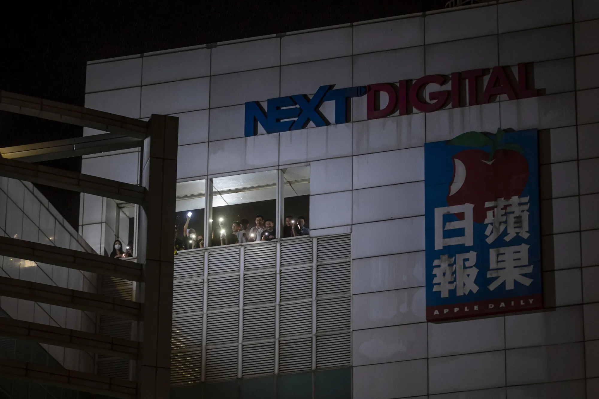 Workers protest from the Next Digital Ltd. offices on June 23,&nbsp;&nbsp;in Hong Kong.