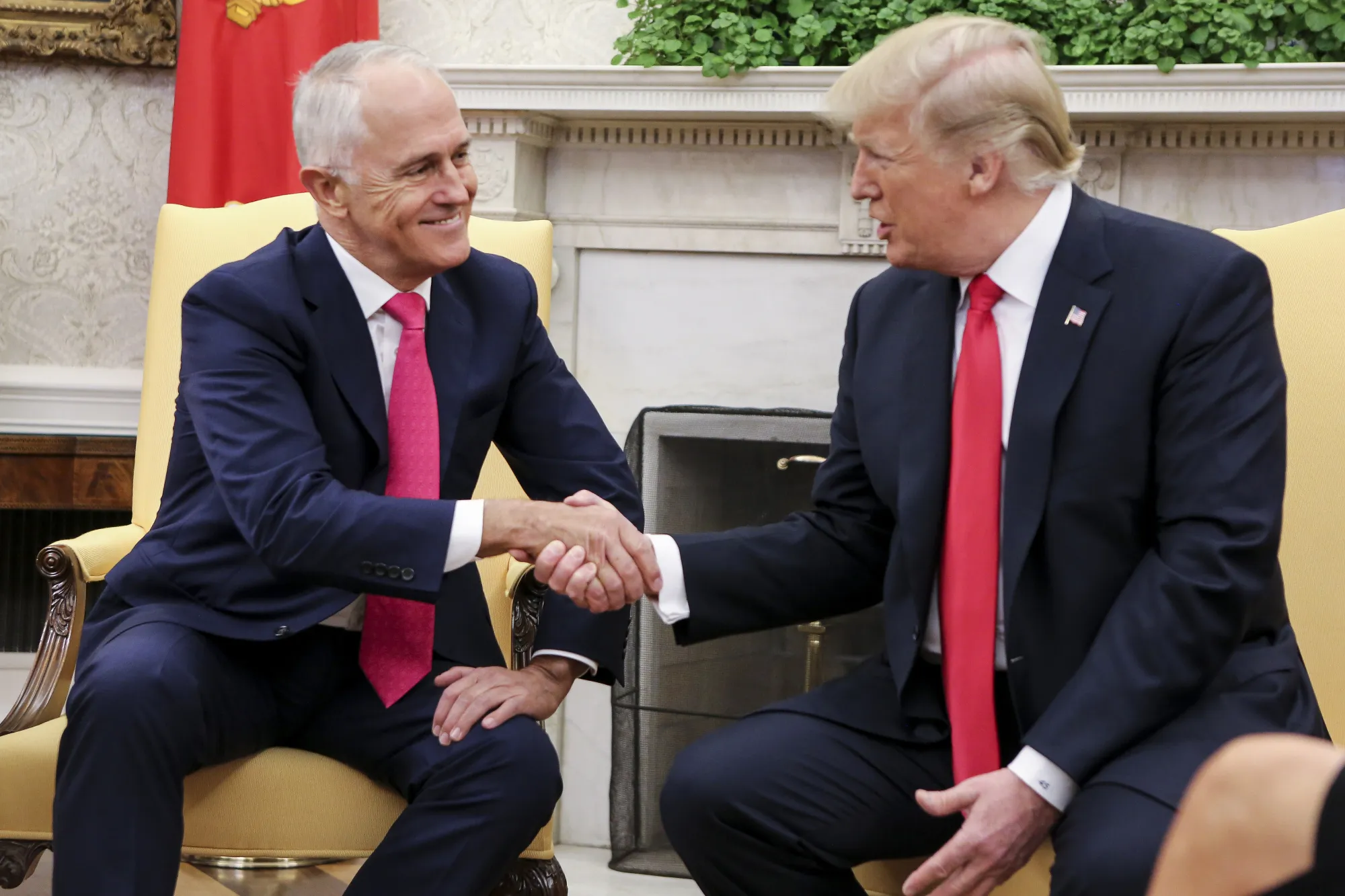 U.S. President Donald Trump, right, shakes hands with Malcolm Turnbull, Australia's prime minister, during a meeting in the Oval Office of the White House in Washington, D.C., U.S., on Friday, Feb. 23.
