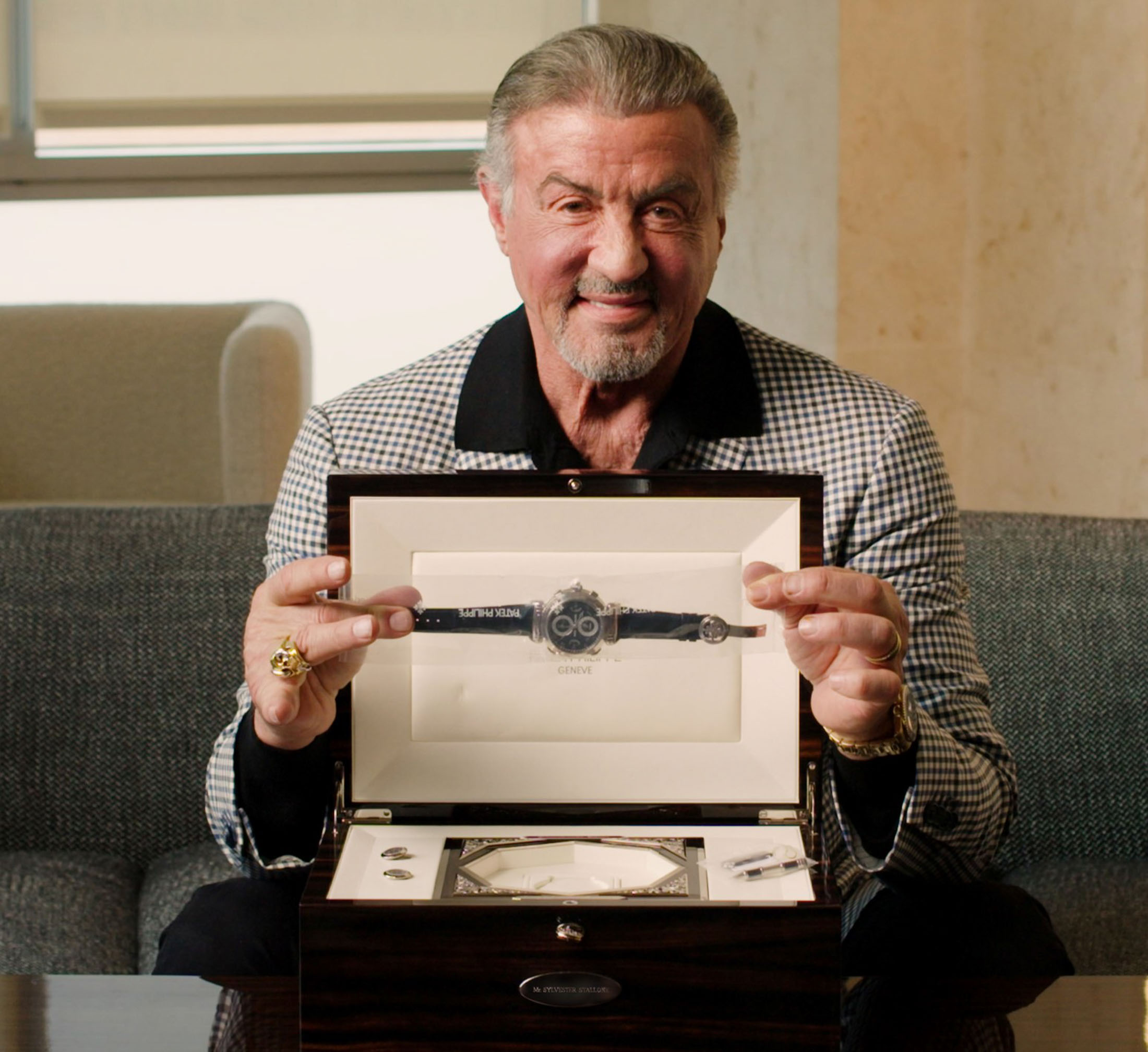 Stallone with his Patek Philippe Grandmaster Chime in its presentation case.