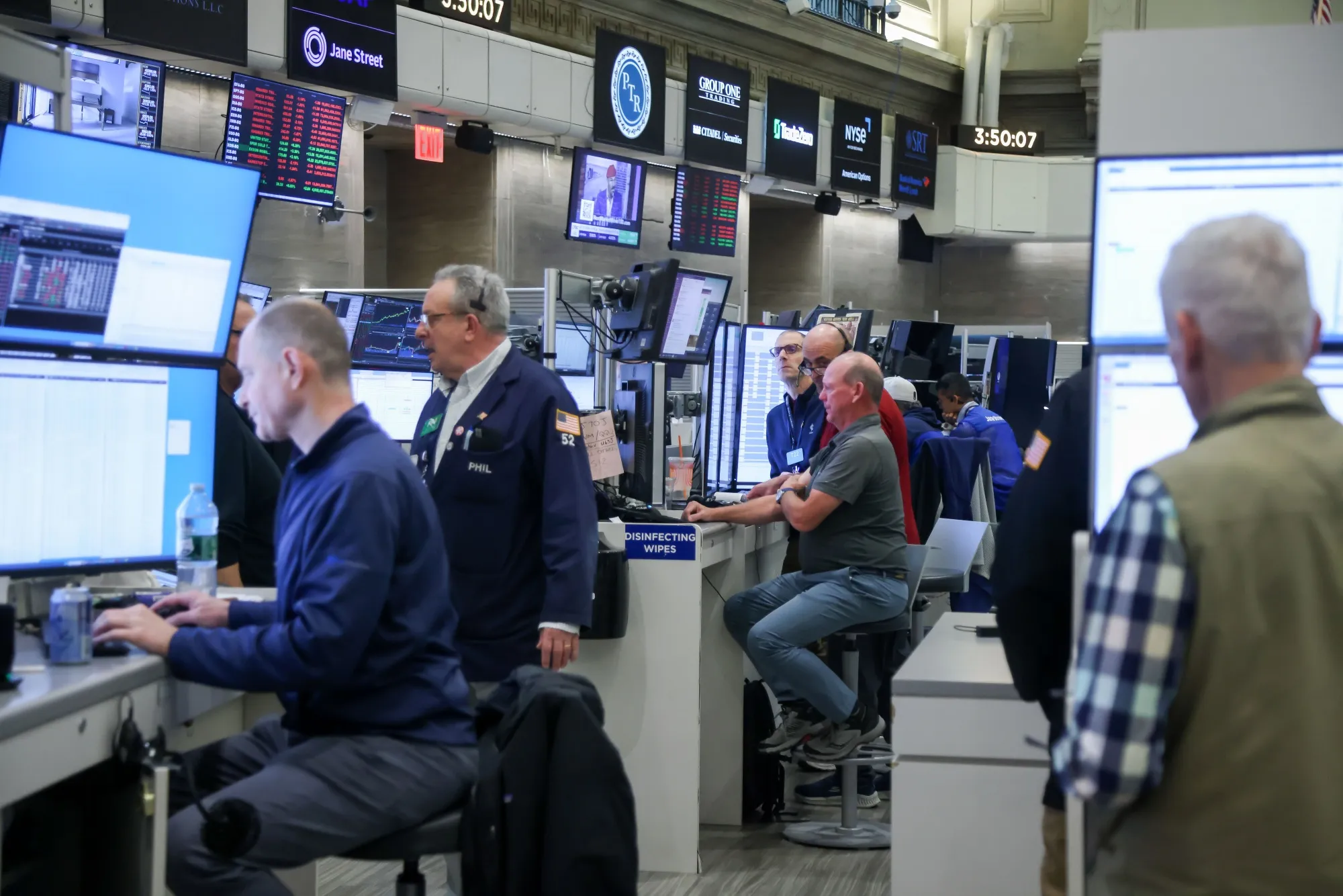 Traders work on the floor of the New York Stock Exchange.