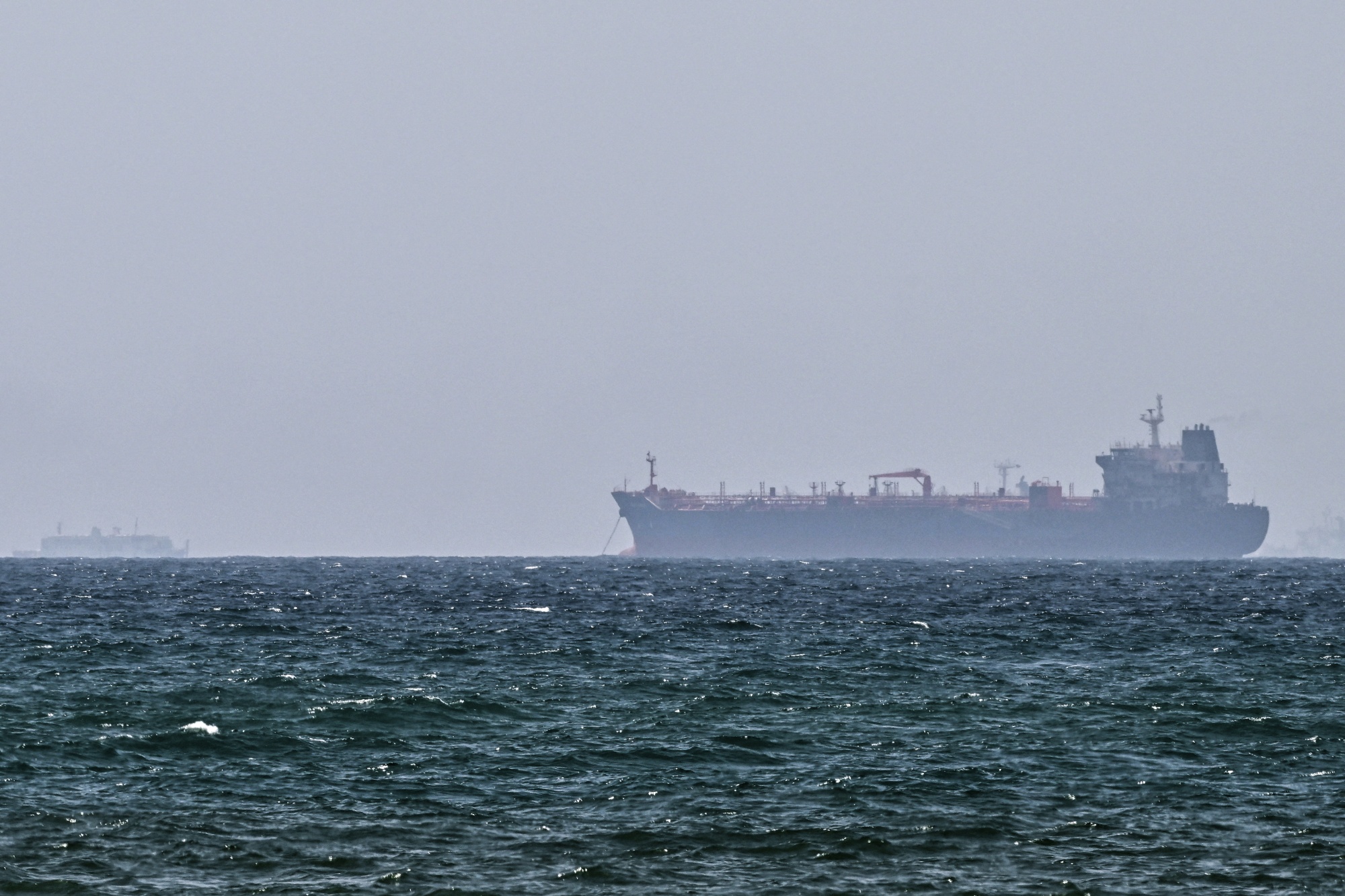 A vessel is anchored off the coast of Sharjah in the United Arab Emirates on May 21.
