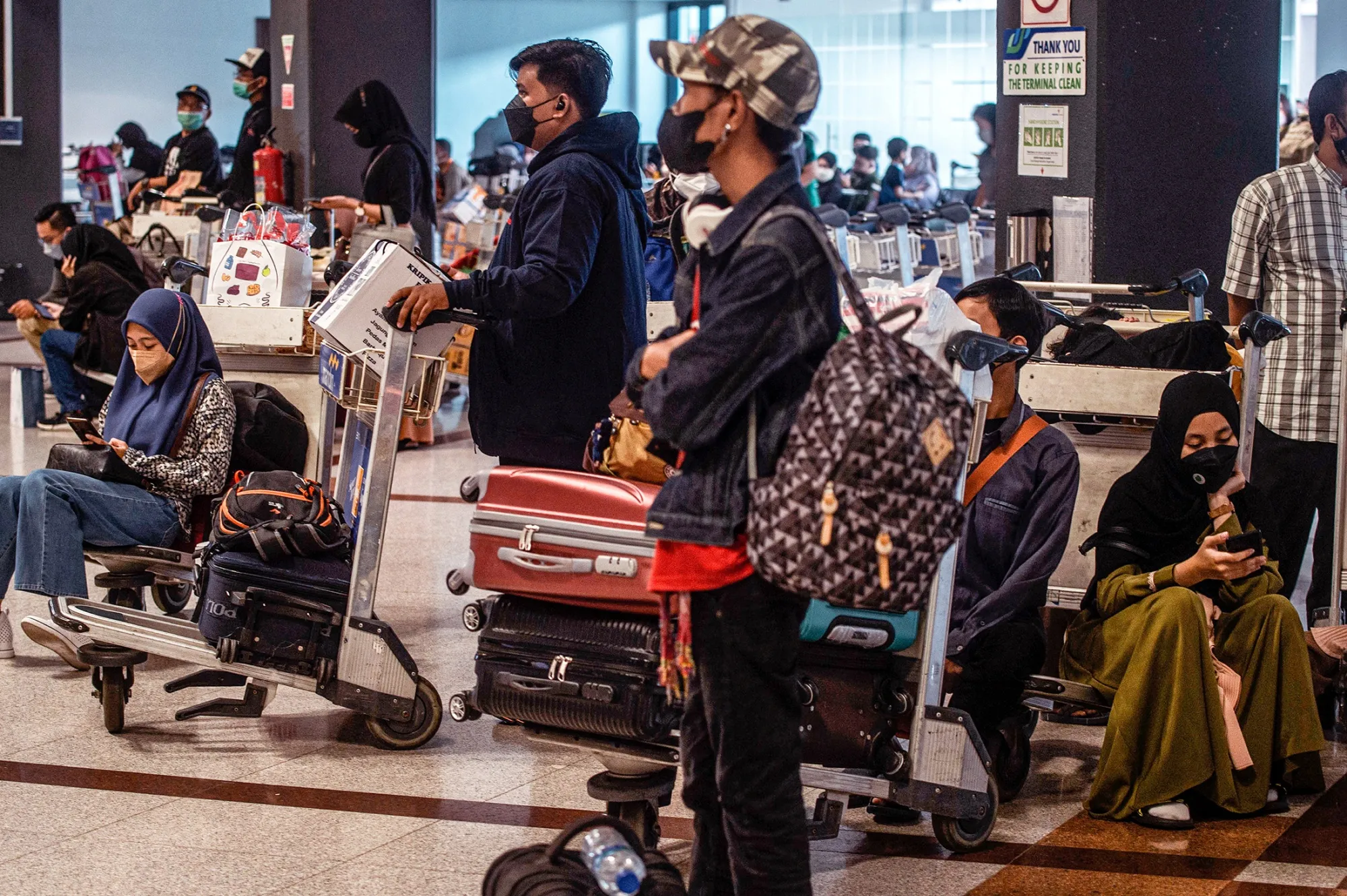 Passengers at Juanda International airport in Sidoarjo, Indonesia, on April 29.