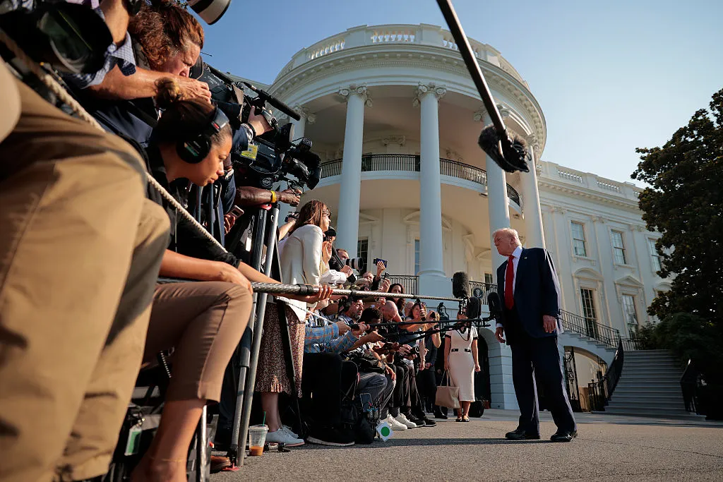 President Donald Trump speaking to reporters before departing the White House on July 25.