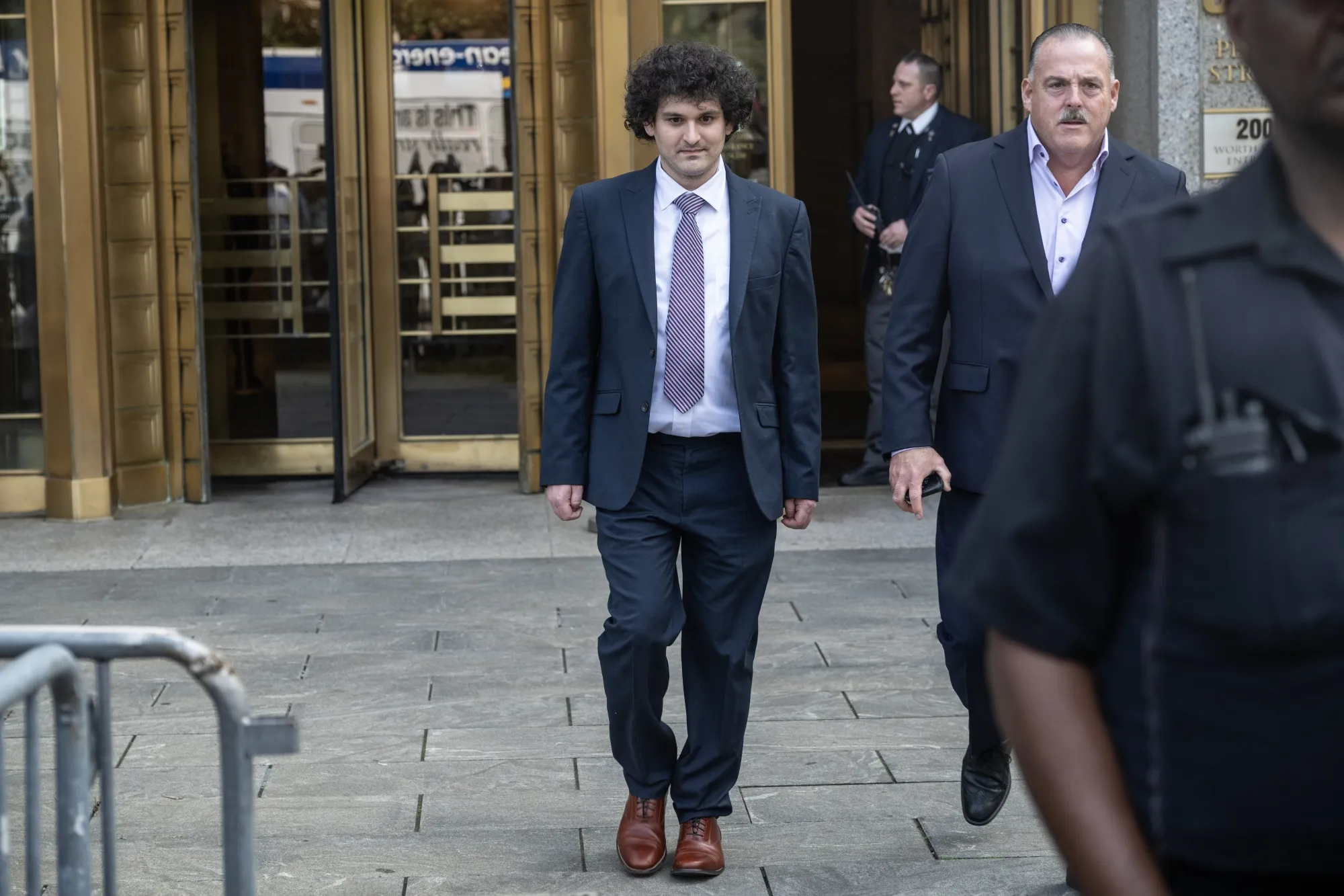 Sam Bankman-Fried leaves court in New York on July 26.