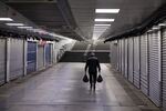 A pedestrian passes retail stores closed to prevent the spread of coronavirus in the Eminonu district of Istanbul on March 25.