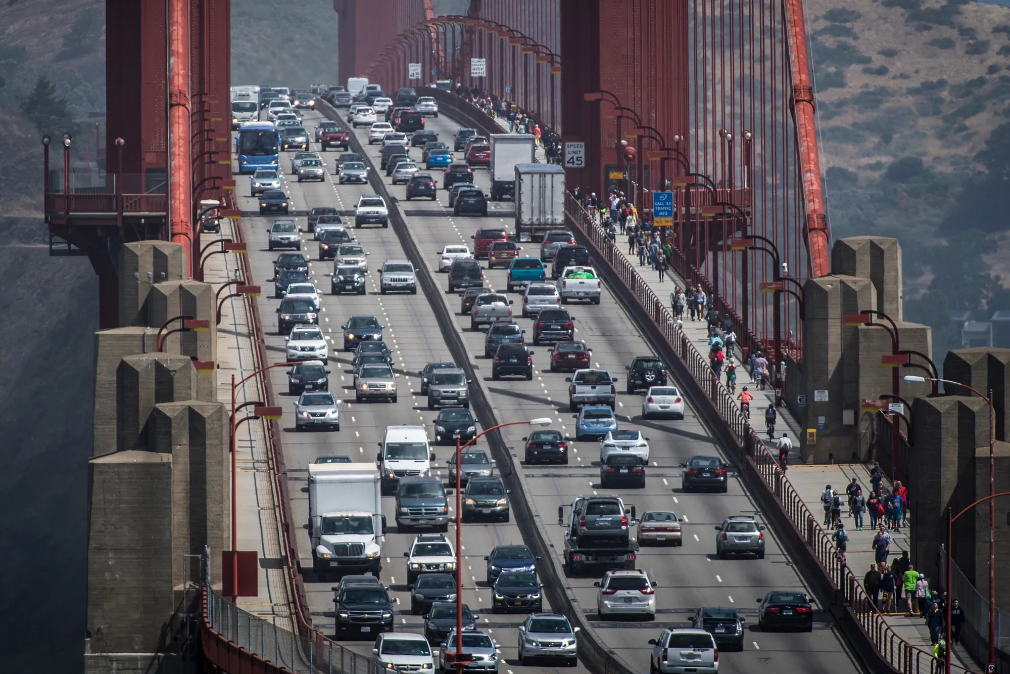 Vehicles travel on the Golden Gate Bridge during the morning commute in San Francisco, California.