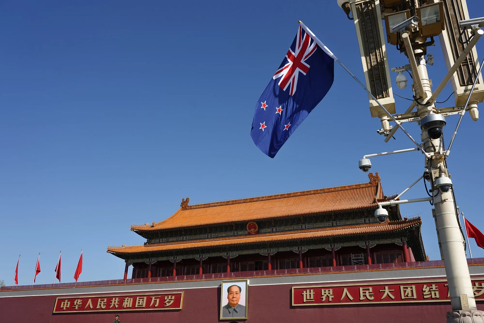 The New Zealand flag waves in Tiananmen Square in Beijing.&nbsp;