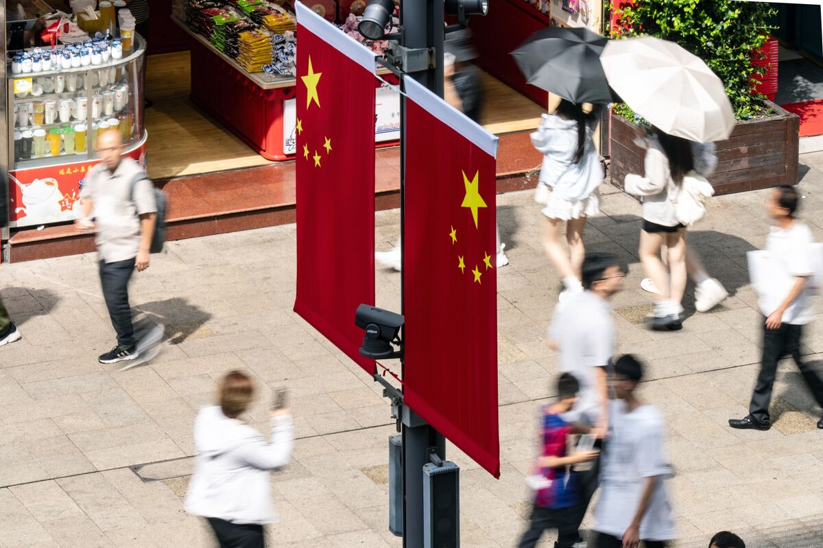ブルームバーグのニュース記事「中国株、貿易摩擦激化でも押し目買い旺盛－米中の応酬に慣れ」の画像