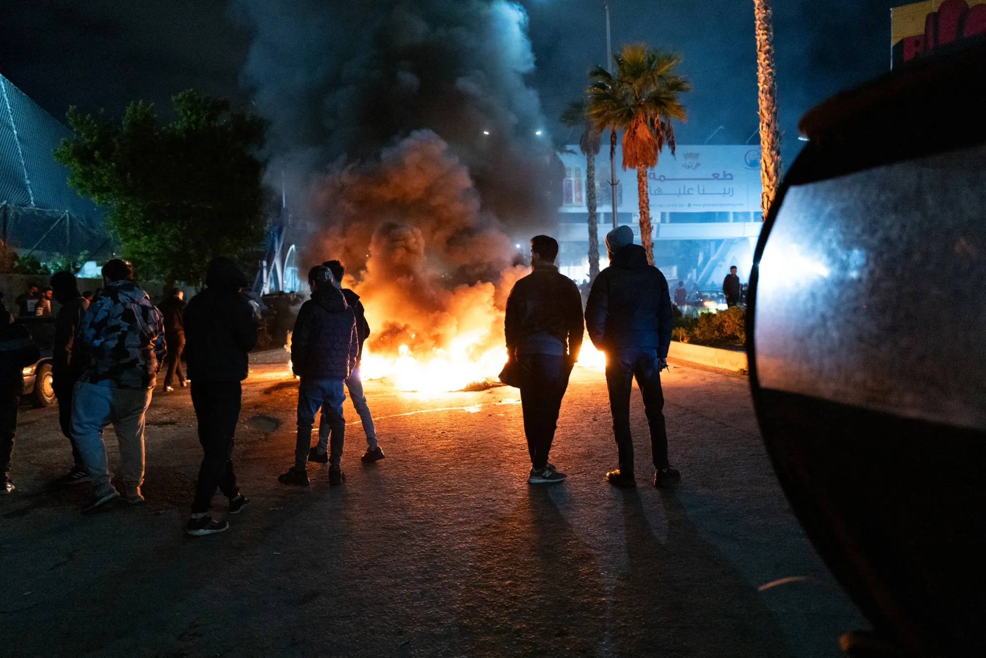 The protesters, some of whom held placards bearing photos and slogans championing the late leader&nbsp;Hassan Nasrallah, set tires alight, causing congestions near the airport.