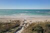 The drainage canal from the Solvay SA plant onto the white beach in Rosignano Solvay, Italy, on Tuesday, Feb. 1, 2022. Photographer: Francesco Mazzei/Bloomberg