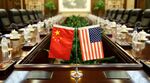 Flags of the US and China.