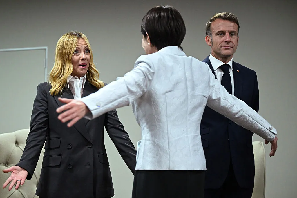 Giorgia Meloni greets Sanae Takaichi at the G-20 summit.
