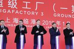 Elon Musk, center, at the site of Telsa’s Gigafactory 3 in Shanghai on Jan. 7.