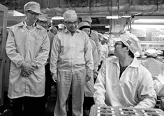 Cook visiting the iPhone production line at Foxconn's Zhengzhou technology park in March 2012