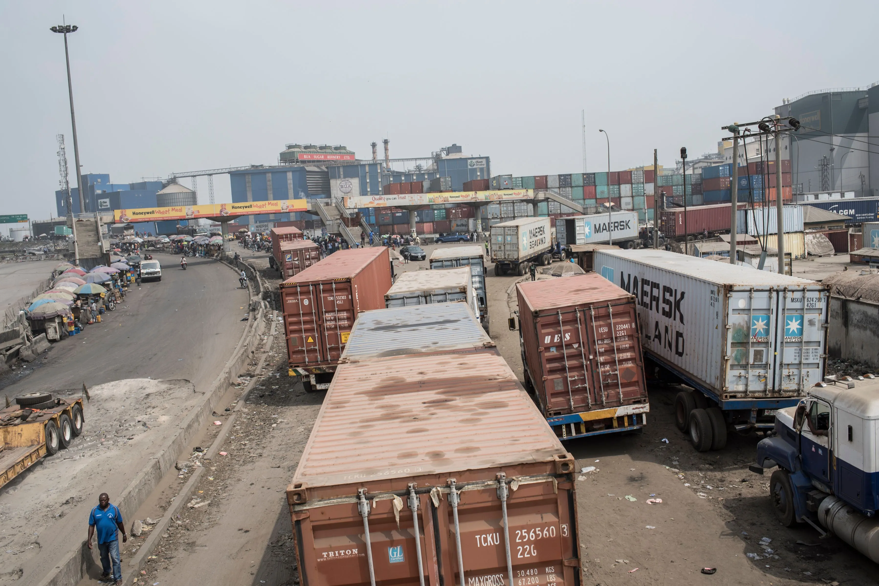Articulated freight truck on Nigerian highway transporting industrial cargo