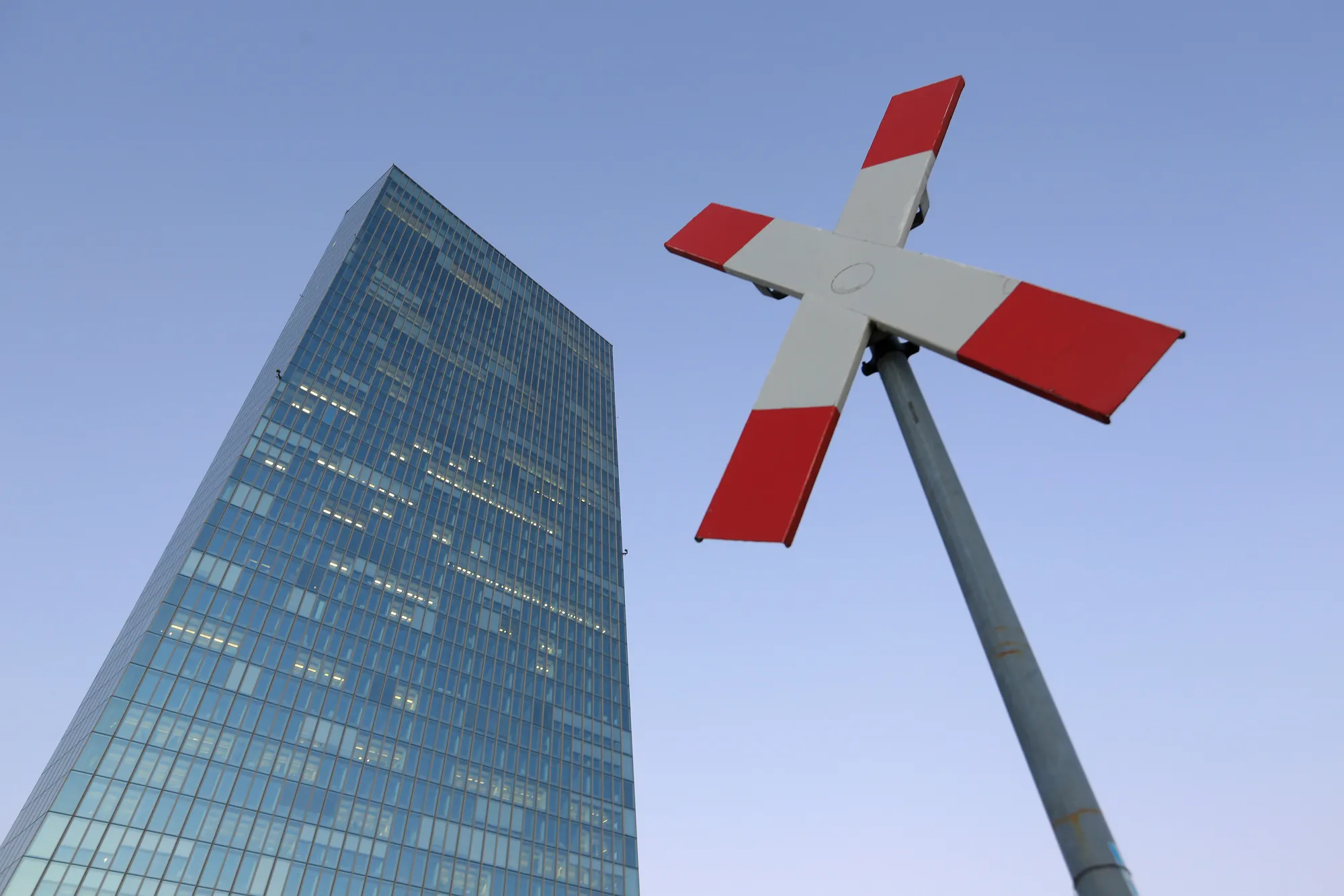 A railway crossing sign stands outside the European Central Bank&nbsp;headquarters in Frankfurt.