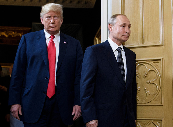 U.S. President Donald Trump Vladimir Putin arrive for a meeting in Helsinki in 2018.