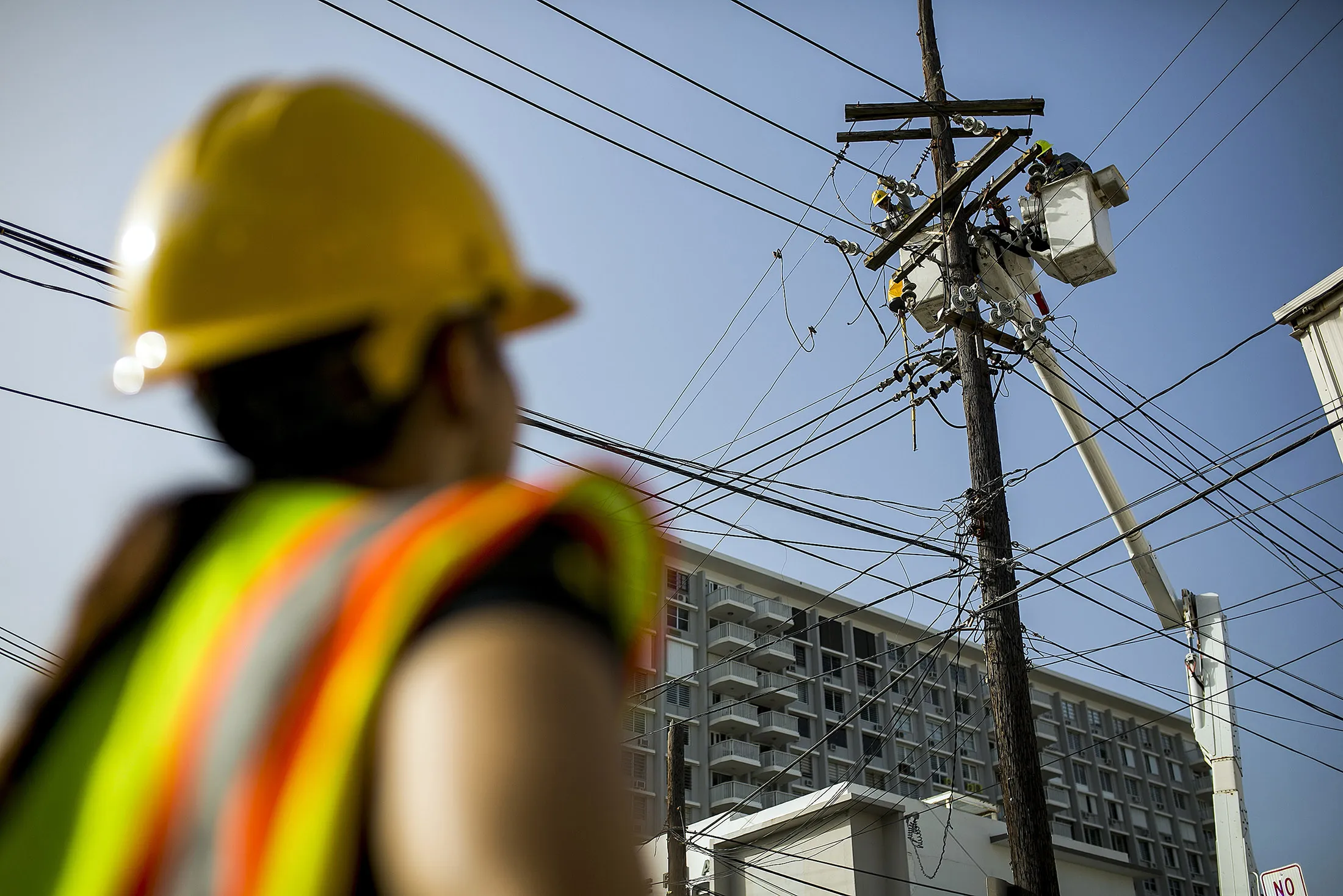 PREPA employees fix power lines in Santurce, San Juan.