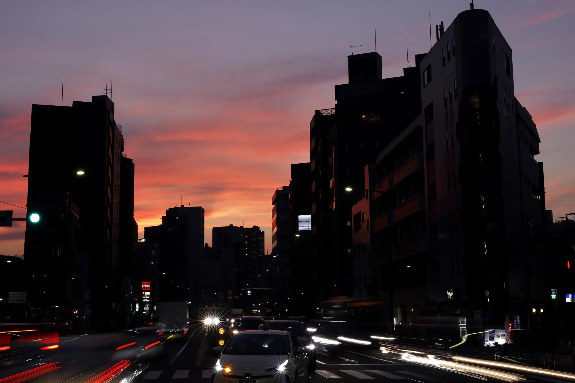 Buildings are silhouetted at dusk in Tokyo during a July&nbsp;heatwave.