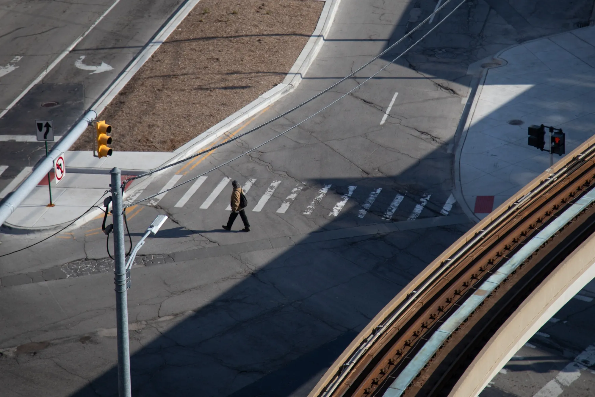 A pedestrian walks through an empty downtown Detroit, Michigan, on&nbsp;April 4.
