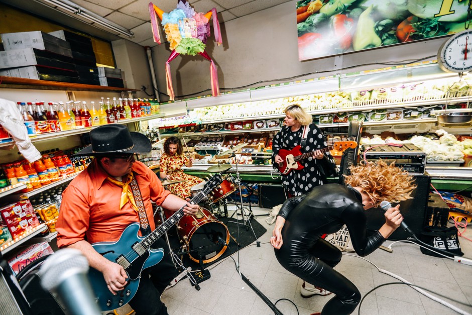 Cleaning up on aisle 3: Washington, D.C.'s Priests play a produce-section benefit for a community grocery store.
