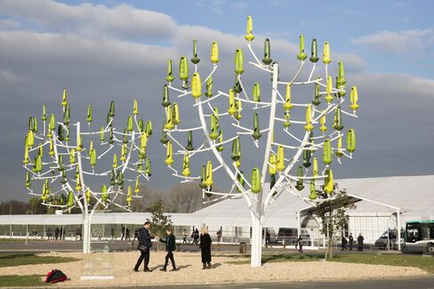 Wind turbine tree sculptures outside the COP21 climate conference