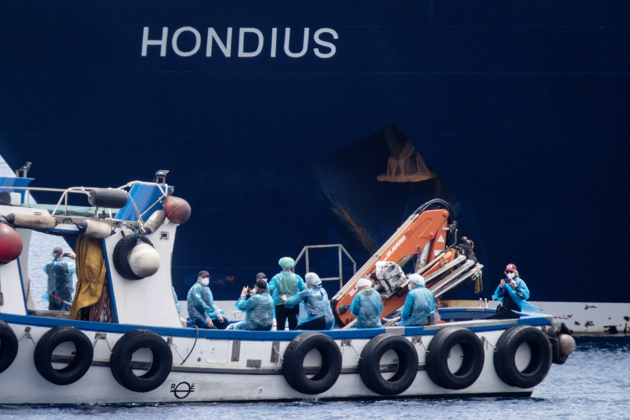 Passengers are evacuated from the MV Hondius cruise ship docked at Granadilla Port in Tenerife, Spain, on May 10.