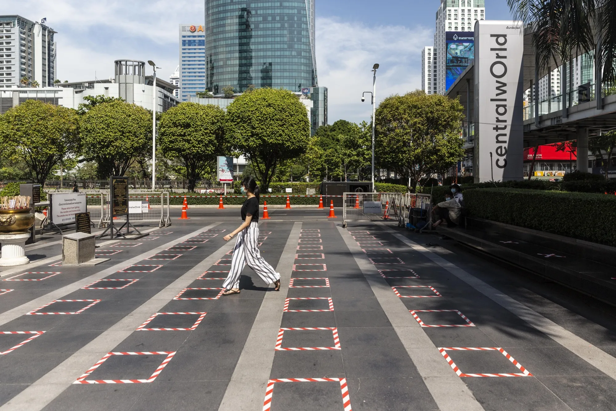 Social distancing markers at the Trimurti Shrine next to Central World Mall in Bangkok.