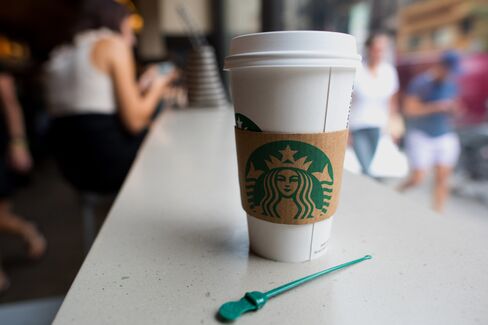 A cup of Starbucks Coffee inside a shop on the corner of Broadway and East 17th Street in Union Square in New York.