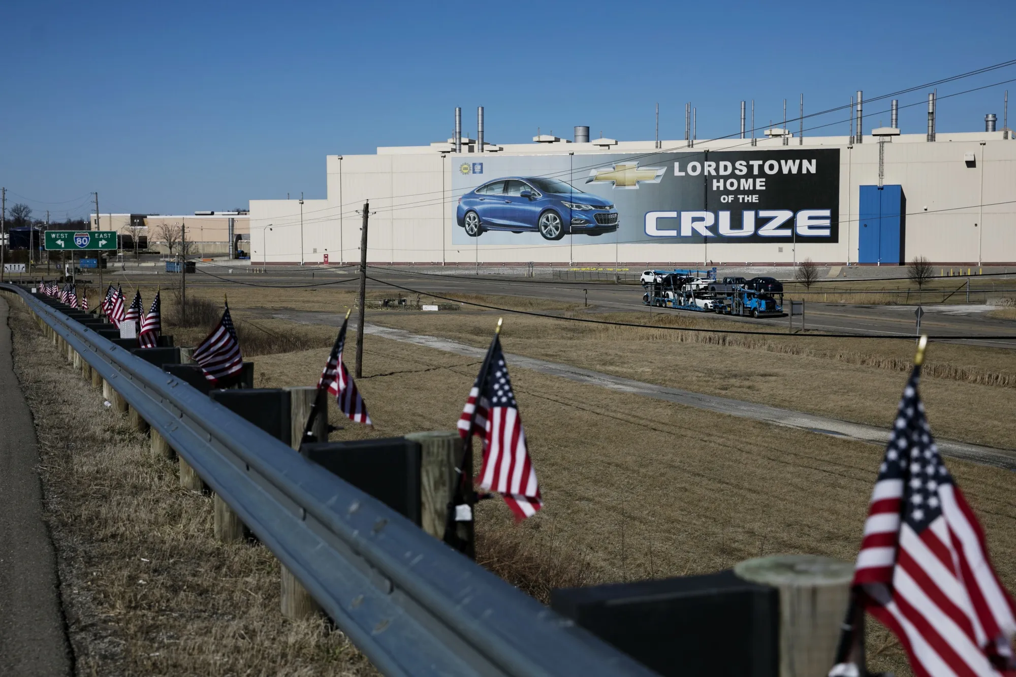American flags fly in front of the General Motors Co. plant in Lordstown, Ohio, on&nbsp;March 26.