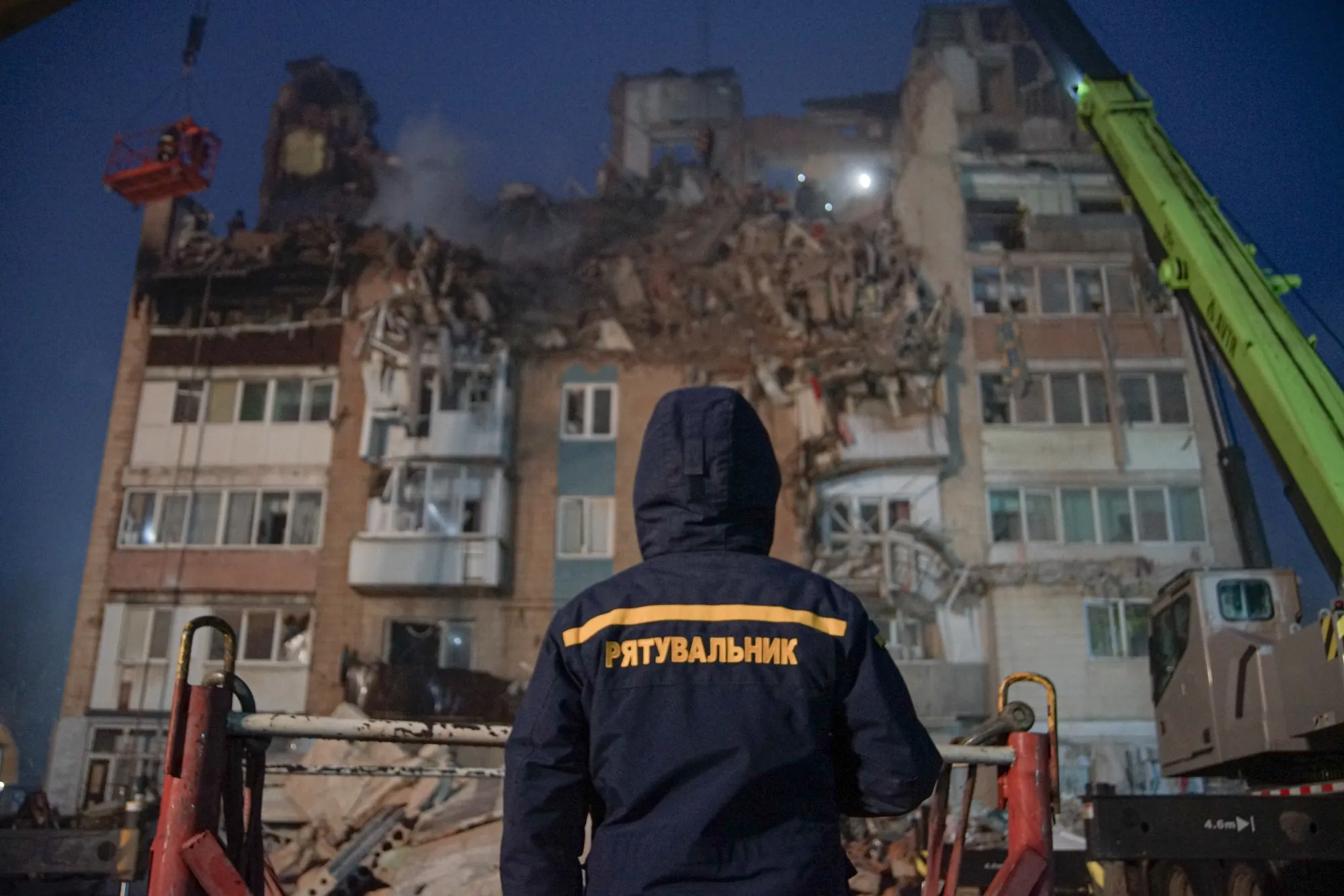 Rescuers work at the site of the Russian strike on the residential multi-story building&nbsp;in Ternopil, Ukraine on Nov. 19.