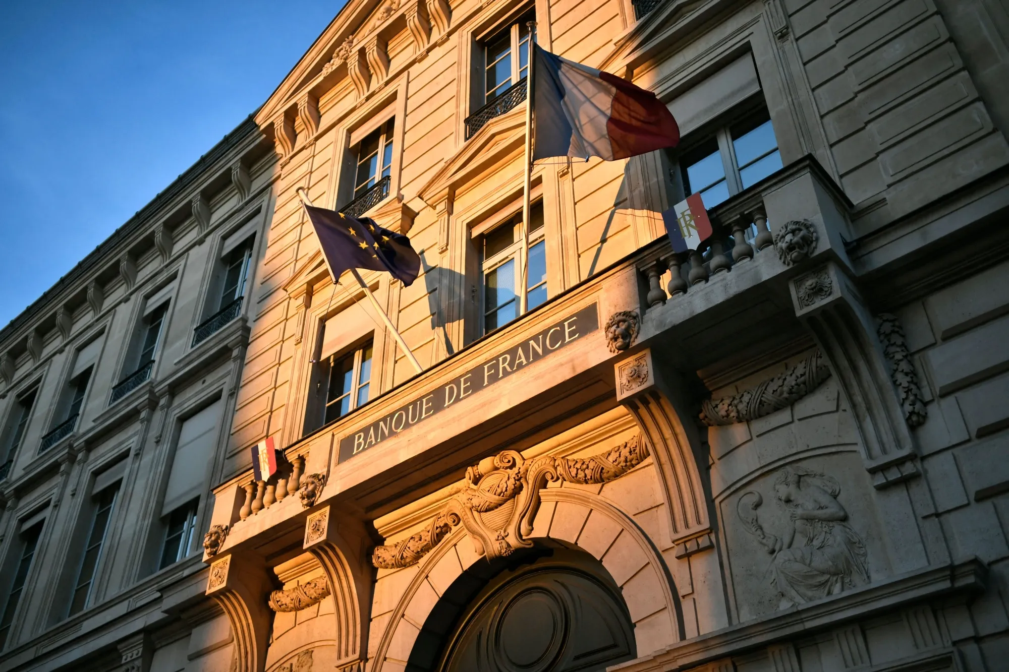 Bank of France Cuts Growth Outlook as Budget Cuts Seen Biting Bloomberg